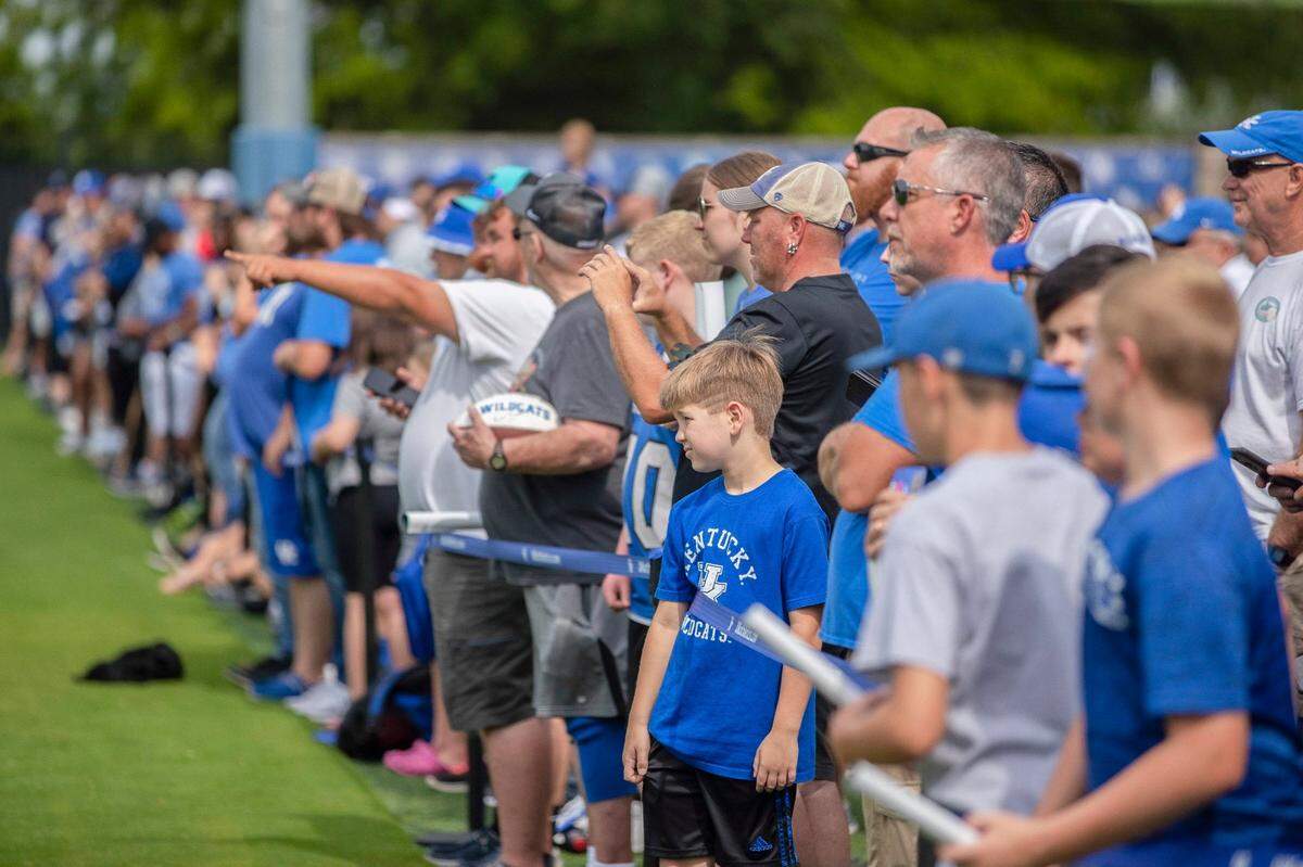 Somehow the skies cleared long enough for a large group of spectators to enjoy Saturday’s annual UK football Fan Day activities.