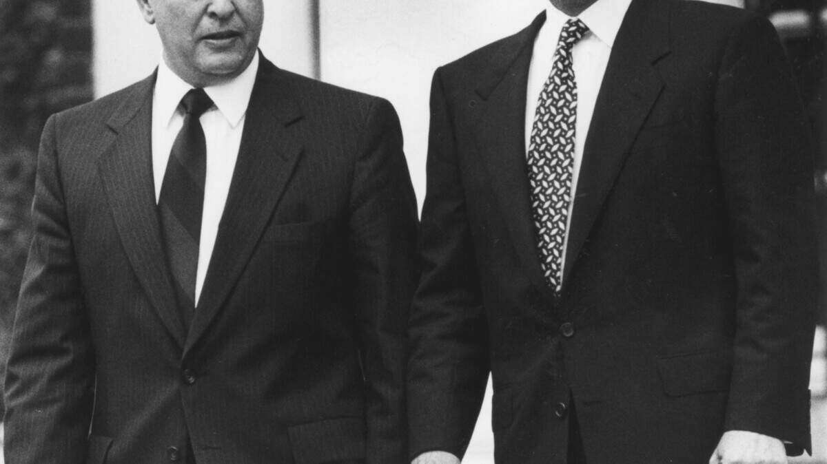 As governor, the late Wallace 
Wilkinson, right, helped make Charles Wethington, his fellow Casey Countian, UK's president in 1990.   