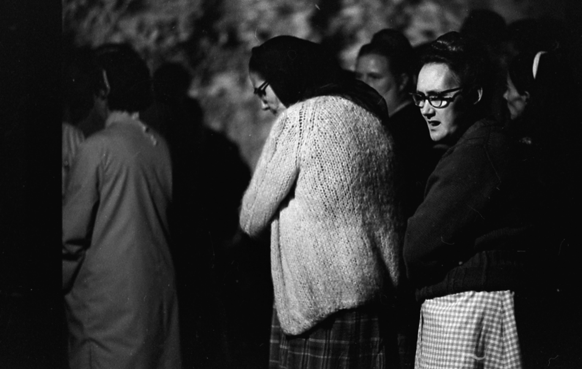 Family members wait to hear news after the explosion at the Hurricane Creek mine. Phil Primack/The Mountain Eagle