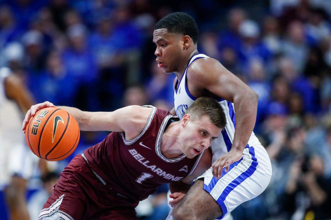 Bellarmine’s Juston Betz (1) drives to the basket against Kentucky’s Sahvir Wheeler during Tuesday’s game at Rupp Arena.