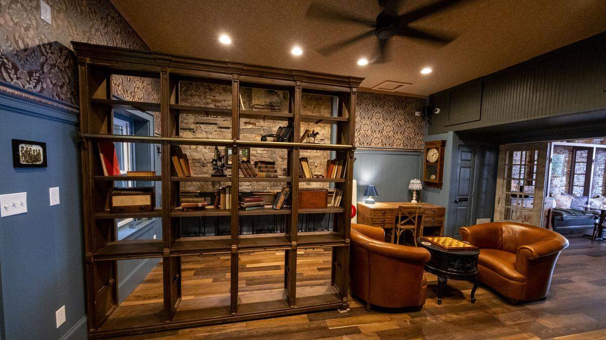 The back sitting room at Serendipity Public House had to have lots on renovation work because of water damage. New floors, walls, ceiling and custom-made decor are throughout the new downtown Midway coffee shop.