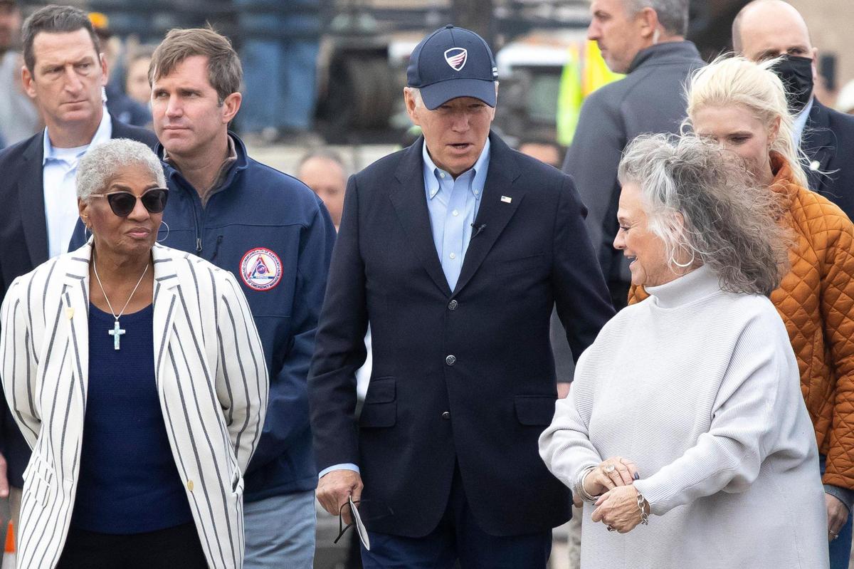 Mayfield Mayor Kathy OÕNan, right, speaks with President Joe Biden during a tour of tornado damage in Mayfield, Ky., with local, state and federal officials on Wednesday, Dec. 15, 2021.