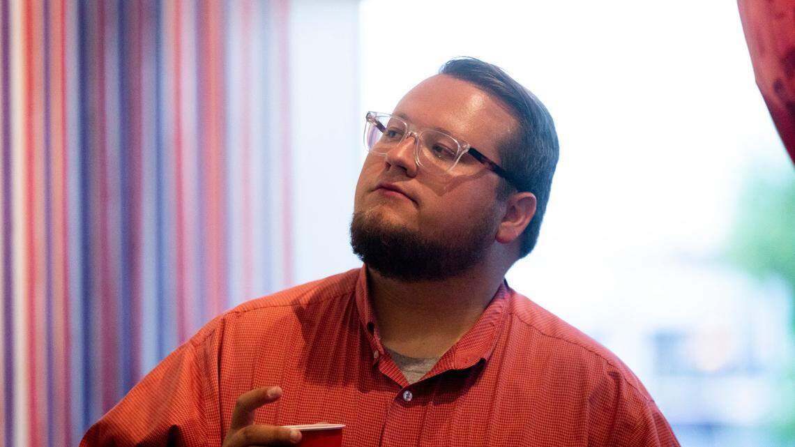 Andrew Cooperrider watches election night results at his watch party at Brewed in Lexington, Ky., on Tuesday, May 17, 2022.