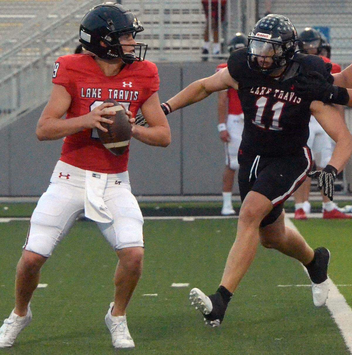 Lake Travis defensive end Ben Duncum (11), pressuring quarterback Jason Carter, is one of the players that Cavaliers' coach Hank Carter says had a standout spring. He'll form one of the area's top defensive end tandems with teammate Carter Buck.
