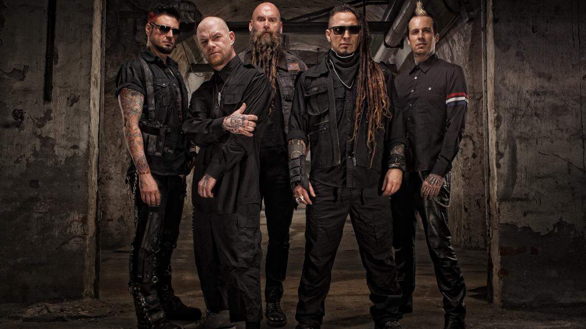 Lexington native Chris Kael, center, and, from left, Five Finger Death Punch bandmates Jason Hook, Ivan Moody, Zoltan Bathory and Jeremy Spencer.