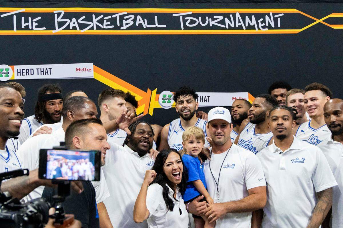 La Familia celebrates winning the Lexington Regional of the TBT tournament on July 21, 2024, at Rupp Arena.