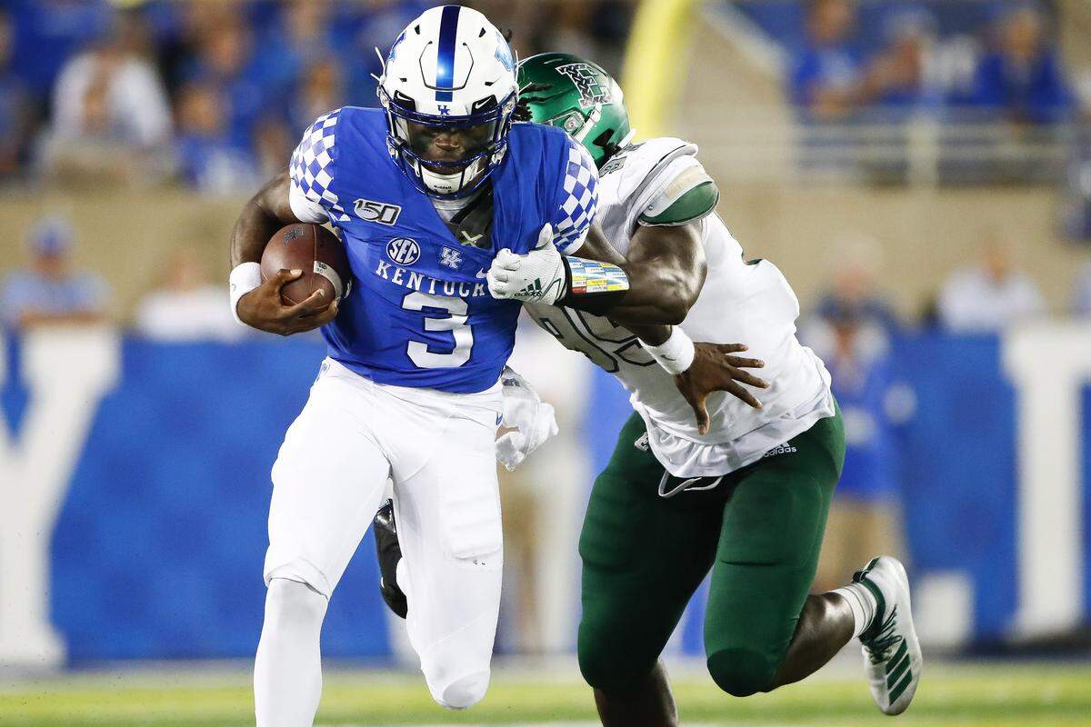 Kentucky quarterback Terry Wilson (3) was tackled by Eastern Michigan defensive lineman Turan Rush (99) in UK’s 38-17 win over EMU in last season’s second game. Wilson suffered a torn patellar tendon in his left knee on the play and missed the remainder of last season..