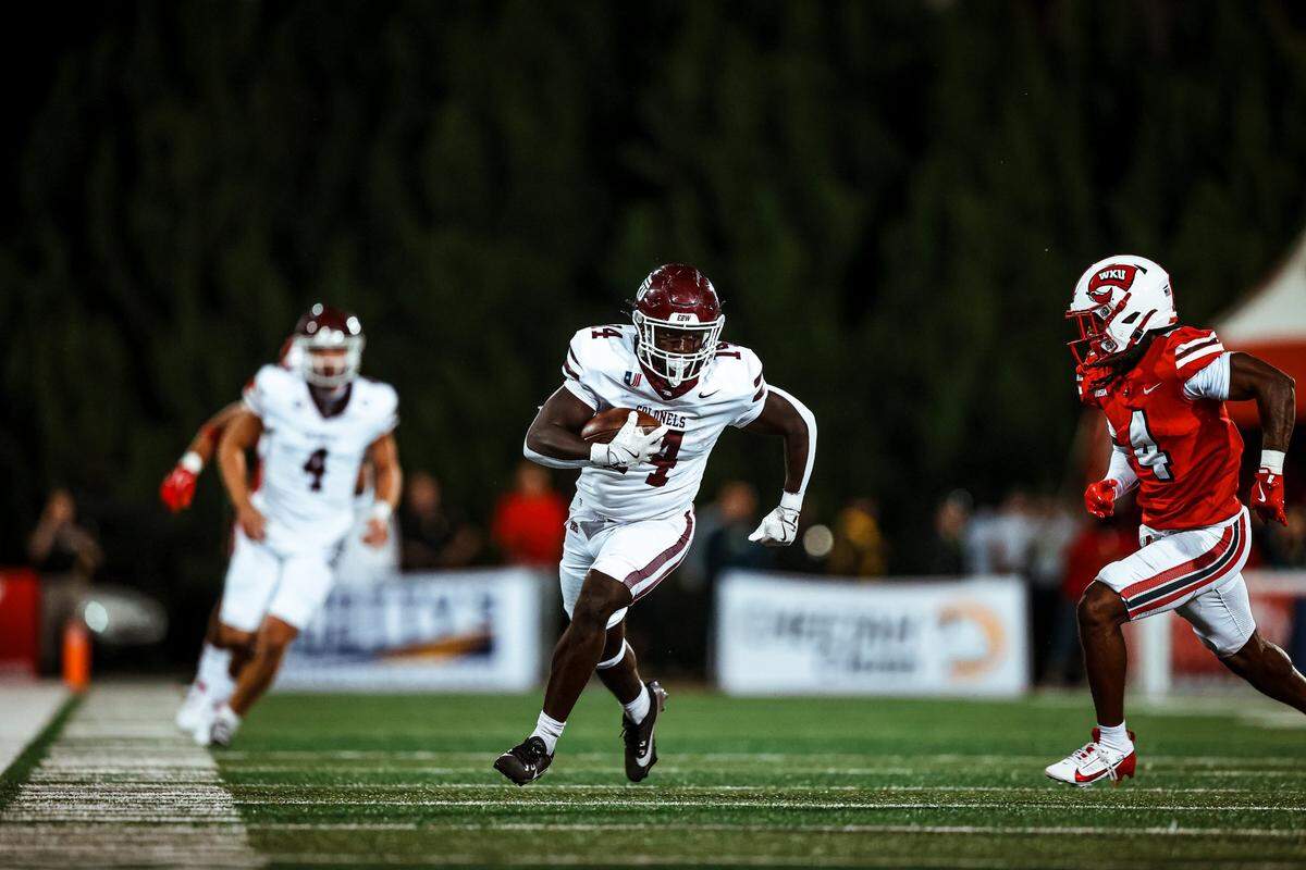 Eastern Kentucky sophomore running back Brayden Latham runs with the ball during the Battle of the Bluegrass between EKU and Western Kentucky at Houchens Industries–L. T. Smith Stadium in Bowling Green, Ky., on Saturday, Sept. 7, 2024.