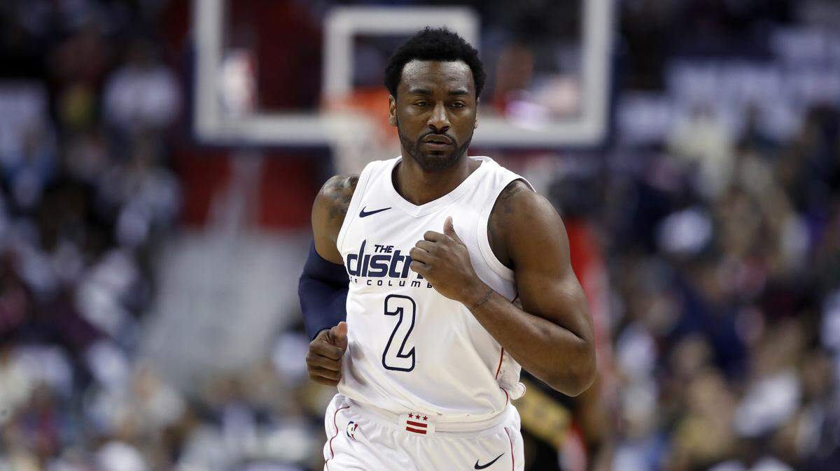 Washington Wizards guard John Wall jogged down the court in the first half of Game 6 of an N. (AP Photo/Alex Brandon)