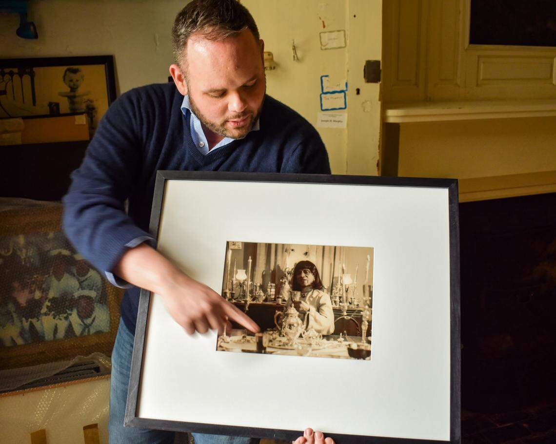 Historian Jonathan Coleman displays a photograph of James Herndon, better known as the Lexington crossdresser Sweet Evening Breeze, an important figure in Coleman’s upcoming book, “Anywhere Together: A Queer History of Kentucky.”