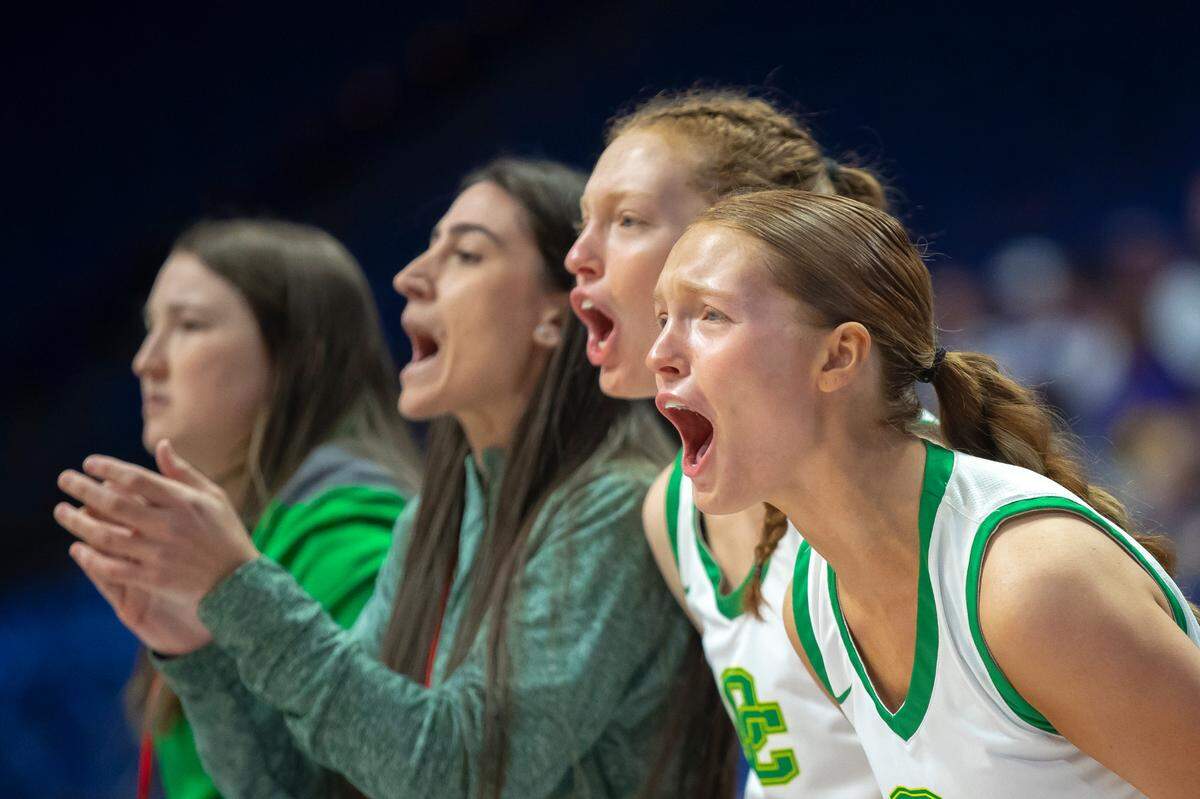 Owensboro Catholic players encouraged their teammates from the bench during the Lady Aces’ opening-round victory over Bowling Green in the 2023 Girls’ Sweet 16 in Rupp Arena on Wednesday.