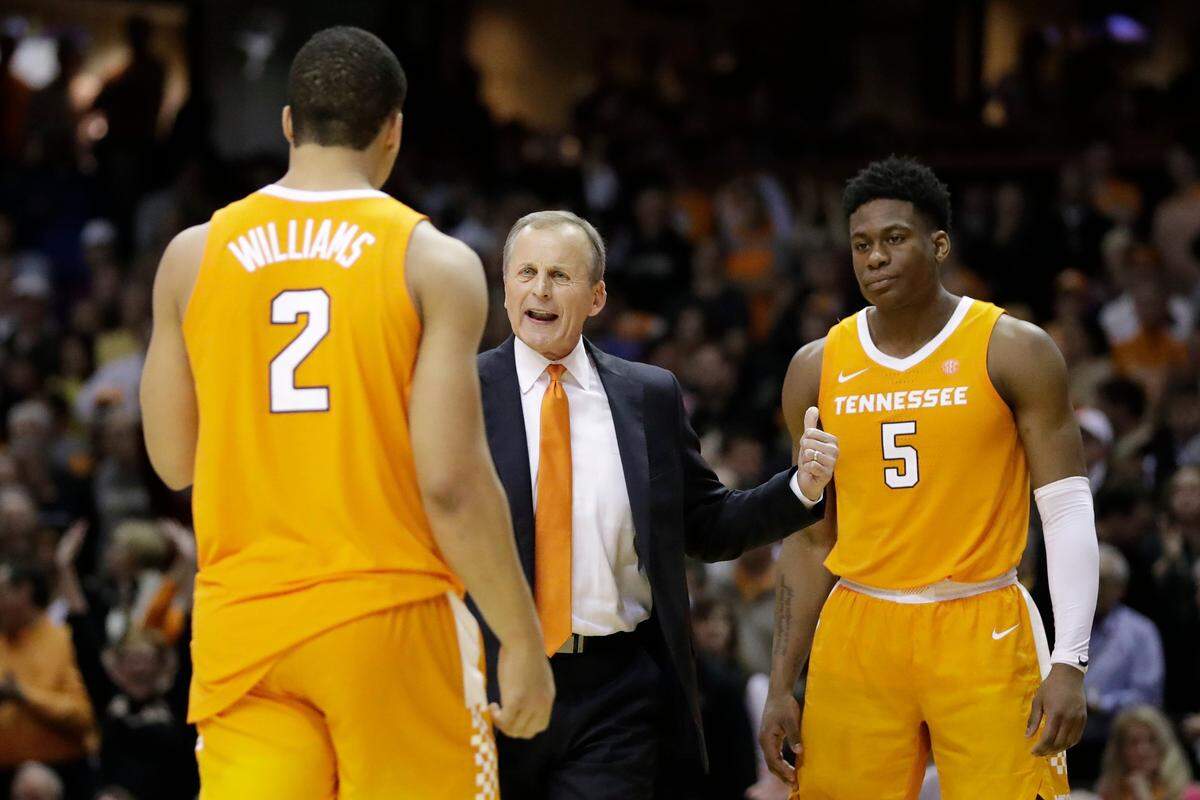 Tennessee head coach Rick Barnes and standouts Grant Williams (2) and Admiral Schofield (5) have driven the Volunteers (22-1, 10-0 SEC) to the No. 1 ranking in the AP men’s college basketball poll.
