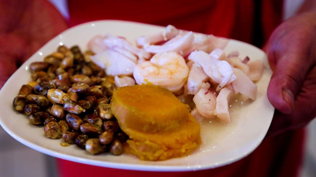 Ceviche, a signature dish served cold in lime juice, with sweet potatoes and canchita corn kernals at Maty’s Authentic Peruvian Cuisine.