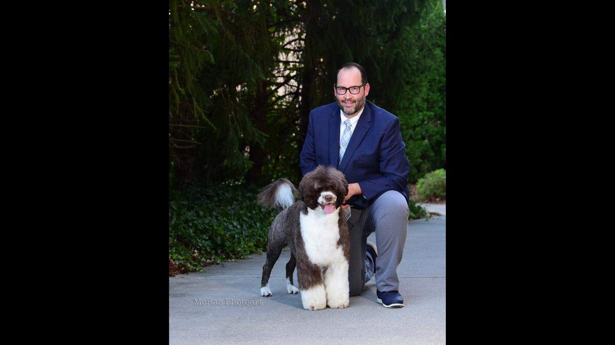 Zac Crump and his Portugese water dog Churchill will compete in the Westminster Kennel Club Dog Show.