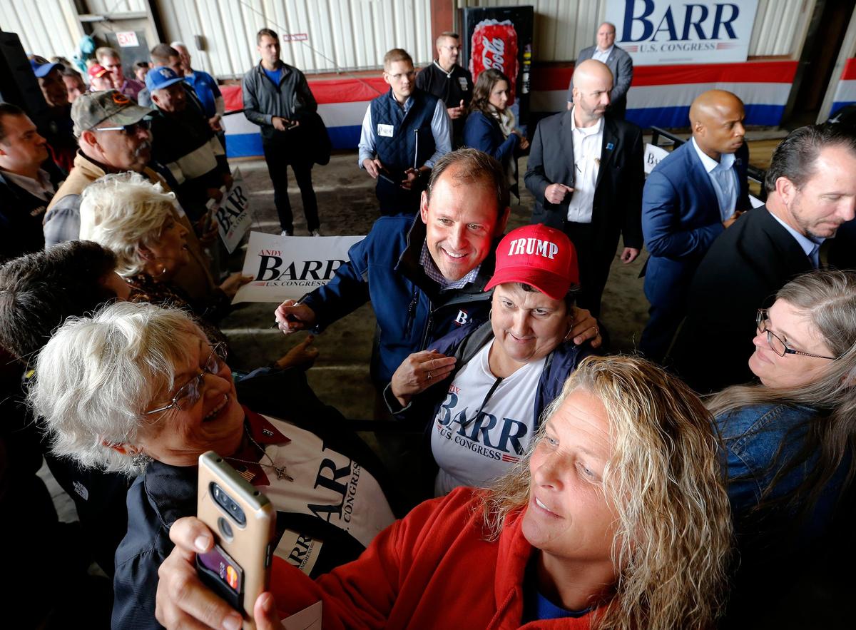 U.S. Rep. Andy Barr posed for a photo with supporters as Donald Trump Jr., made a campaign appearance for him inside a hangar at the Montgomery County Airport in Mt. Sterling, Ky. Barr, a Republican incumbent, is running against Democratic Amy McGrath in Kentucky’s Sixth Congressional District.