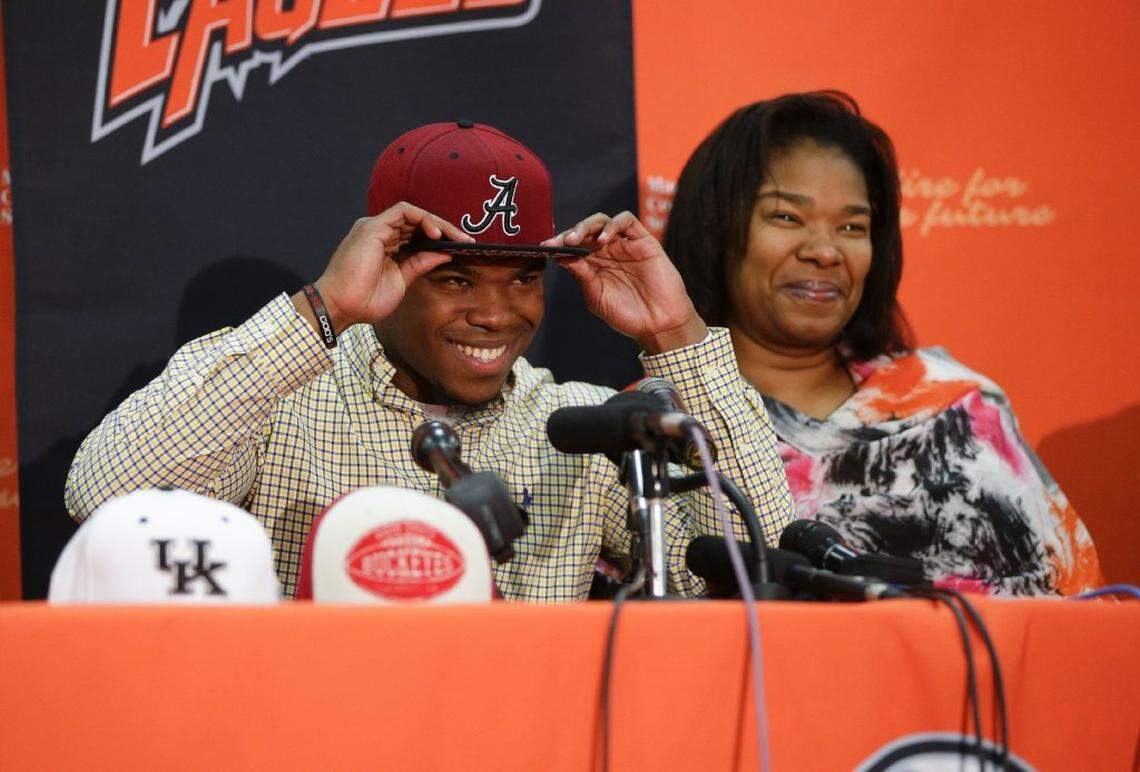 Then Madison Southern High School football star Damien Harris put on an Alabama hat to signify his choosing the Crimson Tide over the home-state Kentucky Wildcats as the team for which he would play college football.