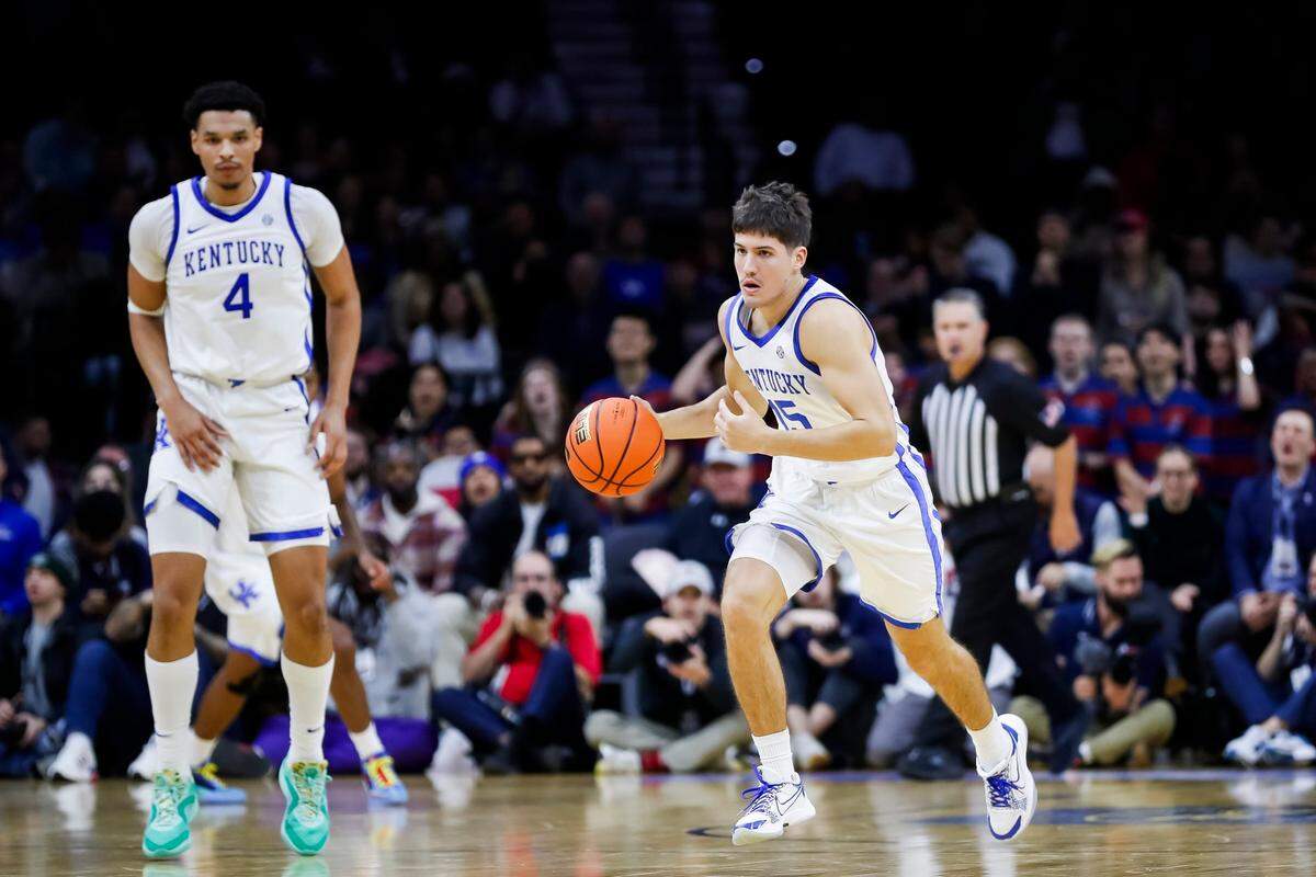 Reed Sheppard, right, and Tre Mitchell were key players in Kentucky’s win over Penn in Philadelphia on Saturday.