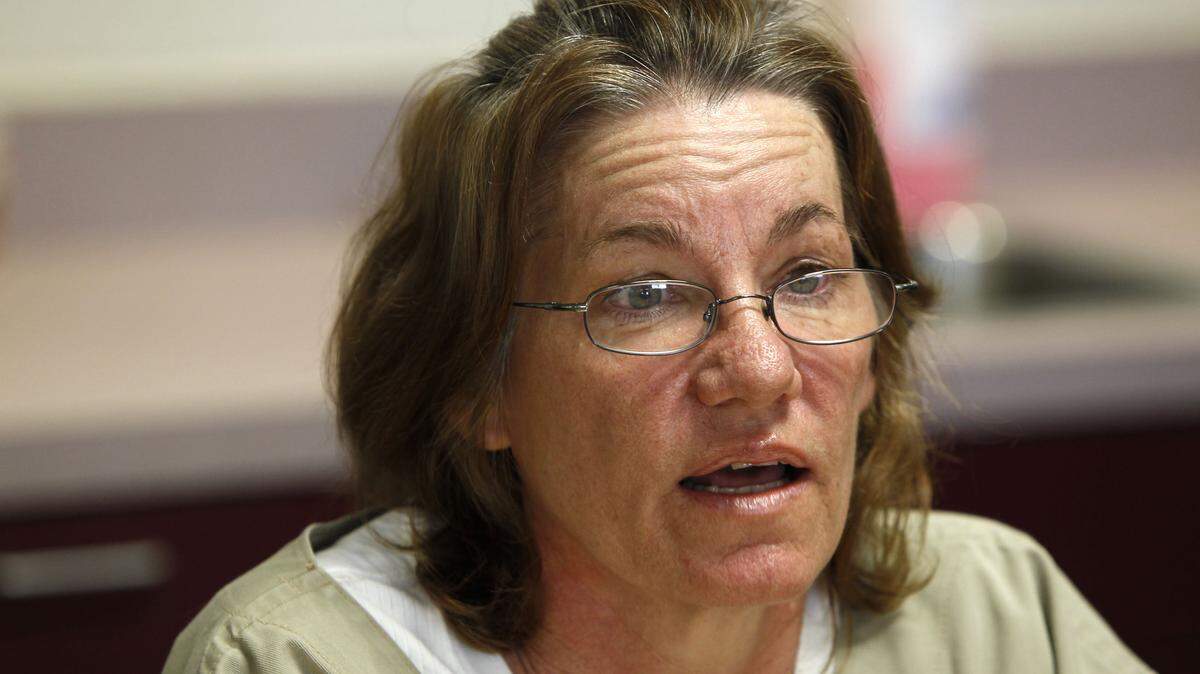 Tina Hickey Powell, 52-years-old, appeared before 2 members the Kentucky Parole Board at her parole hearing in the Kentucky Correctional Institution for Women in Pewee Valley, Ky., Wednesday, April 13, 2011. In 1986, Powell received a sentence of Life without the possibility of Parole for 25 years after being convicted of murdering 5 people in Lexington. The Parole Board members questioning Powell during the morning hearing were Larry Chandler and Shannon Jones. They deferred the decision to the full Parole Board on Monday. Charles Bertram | Staff