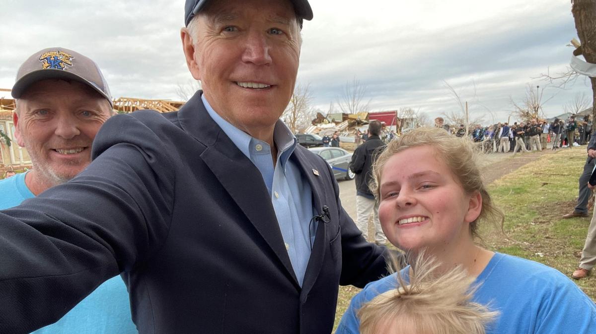Abby Parker, right, takes a selfie with President Joe Biden during his visit to Dawson Springs, Kentucky, on Wednesday, December 15, 2022. Parker is a Dawson Springs native and will graduate from the University of Kentucky this week.