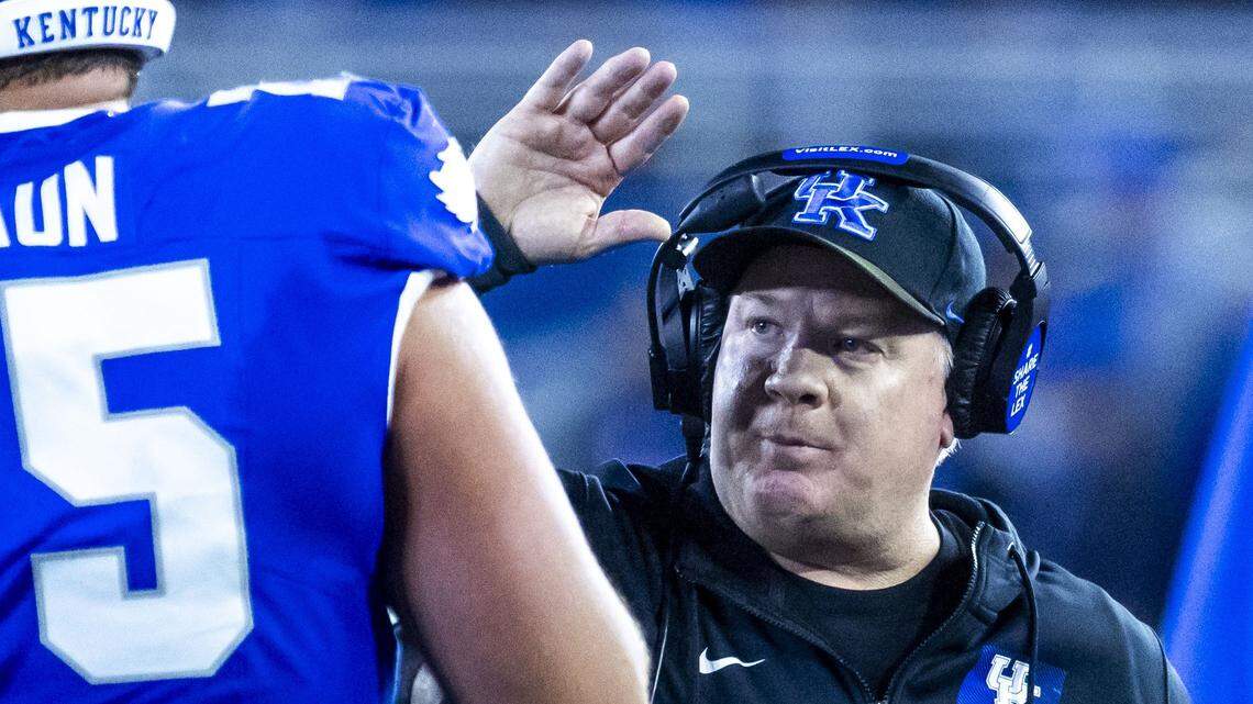 Kentucky head coach Mark Stoops celebrates after a second-quarter Wildcats touchdown during Saturday’s game against Florida.
