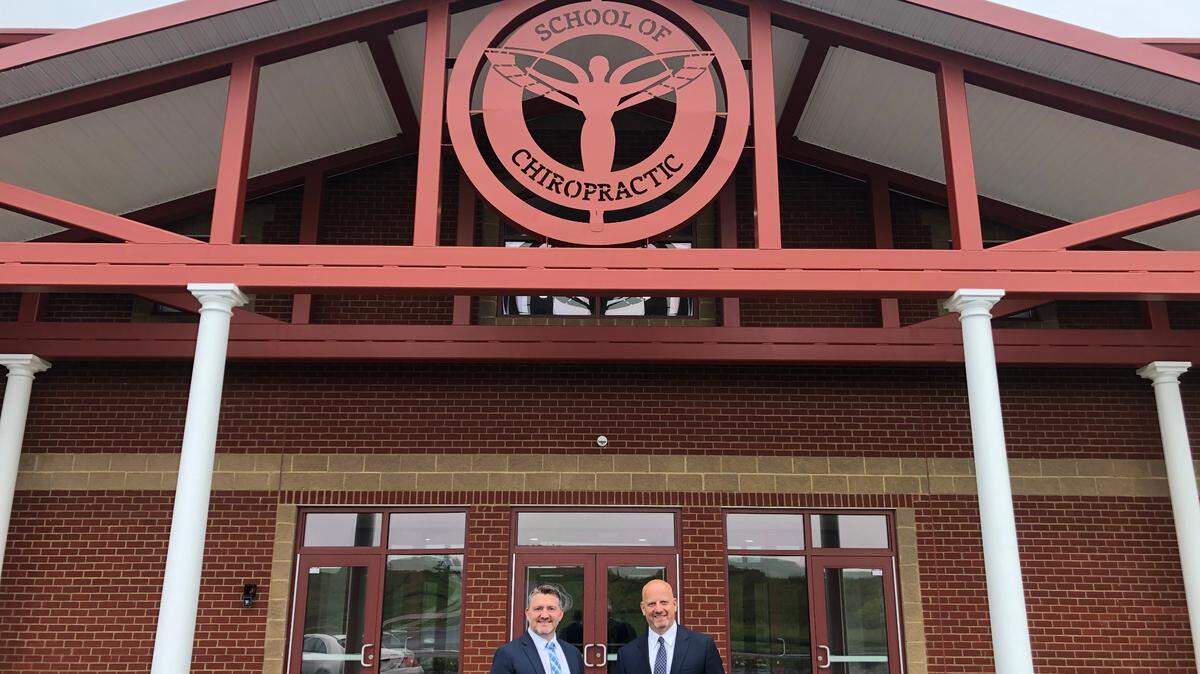 Trevor Foshang, left, and Dennis Short stand outside the School of Chiropractic at the Campbellsville University Harrodsburg campus on Sept. 21, 2021.