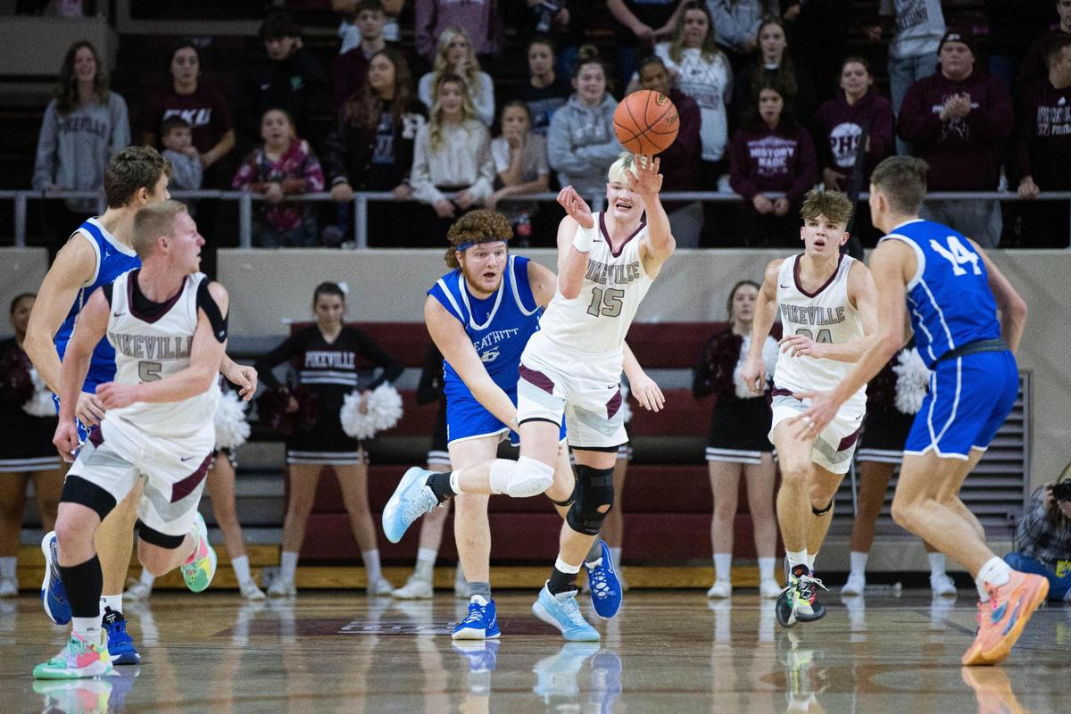 Pikeville’s Rylee Samons (15) passes the ball during the Panthers’ victory Sunday. Samons scored a team-high 16 points in the championship game.