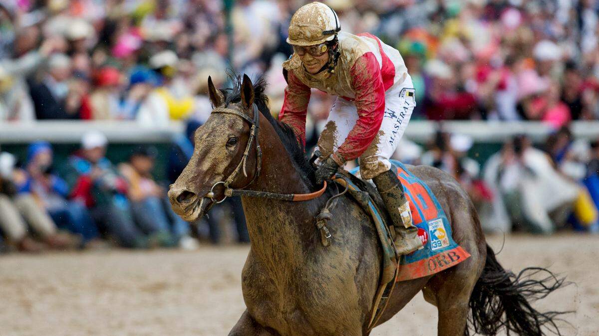Orb, with Joel Rosario up, won the Kentucky Derby on Saturday on a muddy track at Churchill Downs.  Photo by Mark Cornelison | Staff