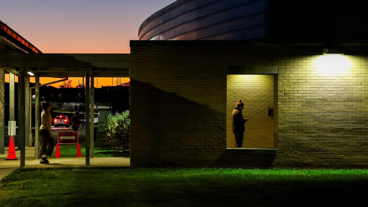 The line to vote in the 2024 general election at Tates Creek Elementary School stretched outside the main door at 6:30 a.m. Tuesday.