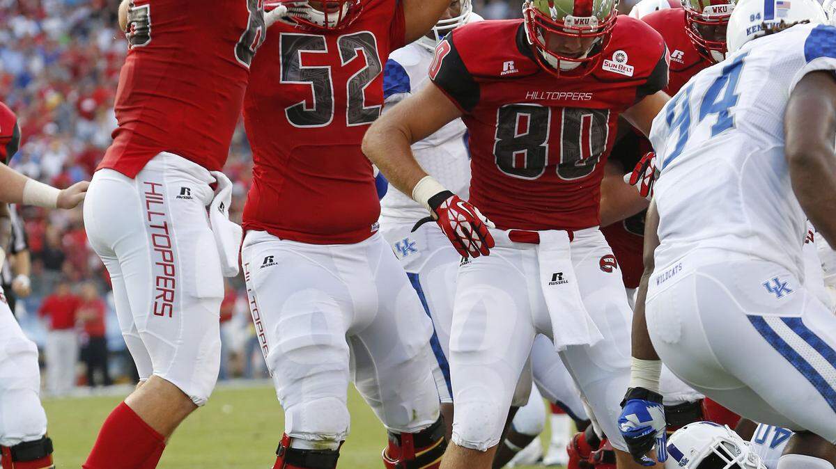 Western Kentucky Hilltoppers running back Keshawn Simpson (34) scored a touchdown during the first quarter as UK played WKU at LP Field on Saturday, Aug. 31, 2013 in Nashville, Tenn. Photo by Amy Wallot