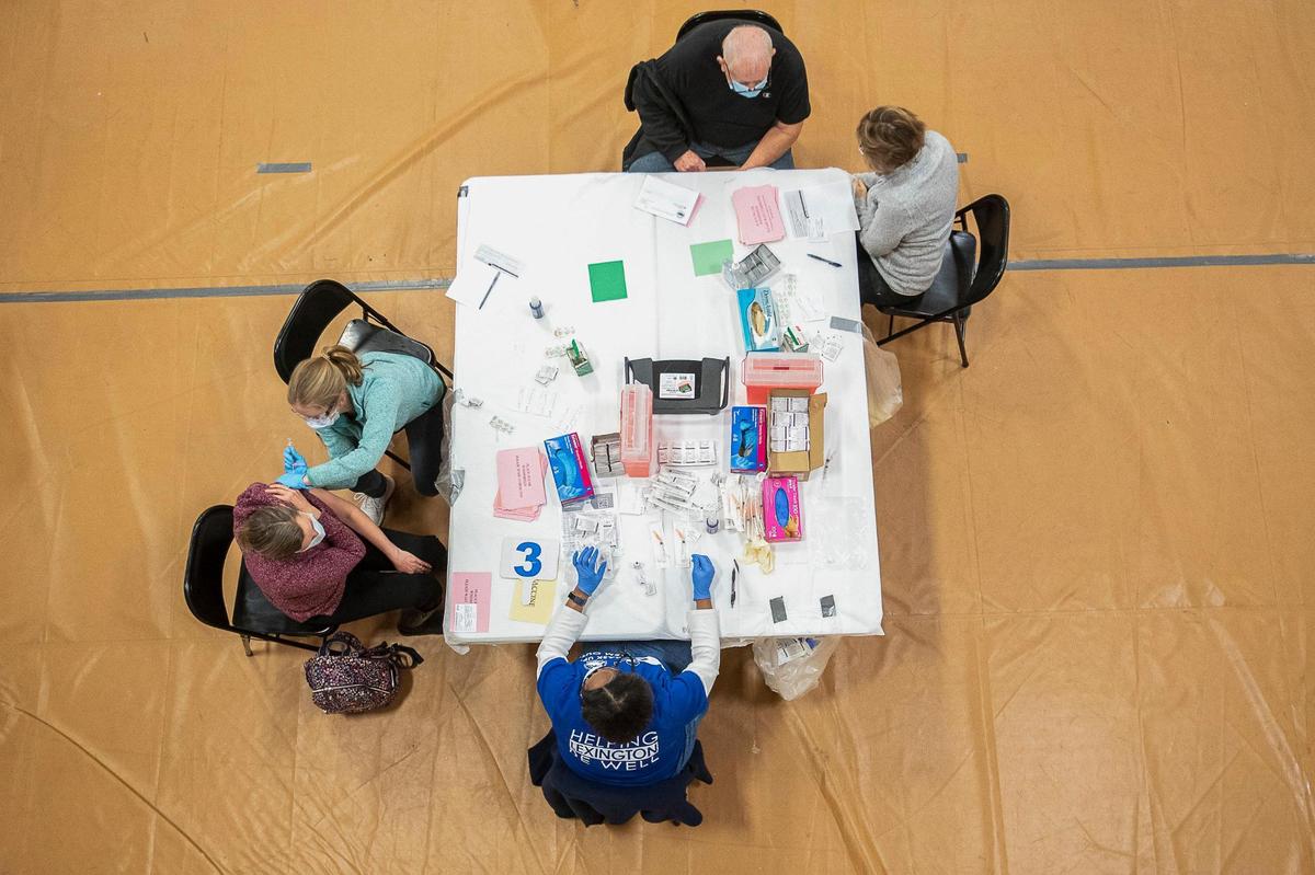 People were vaccinated by the Lexington-Fayette County Health Department at Consolidated Baptist Church in Lexington Wednesday.