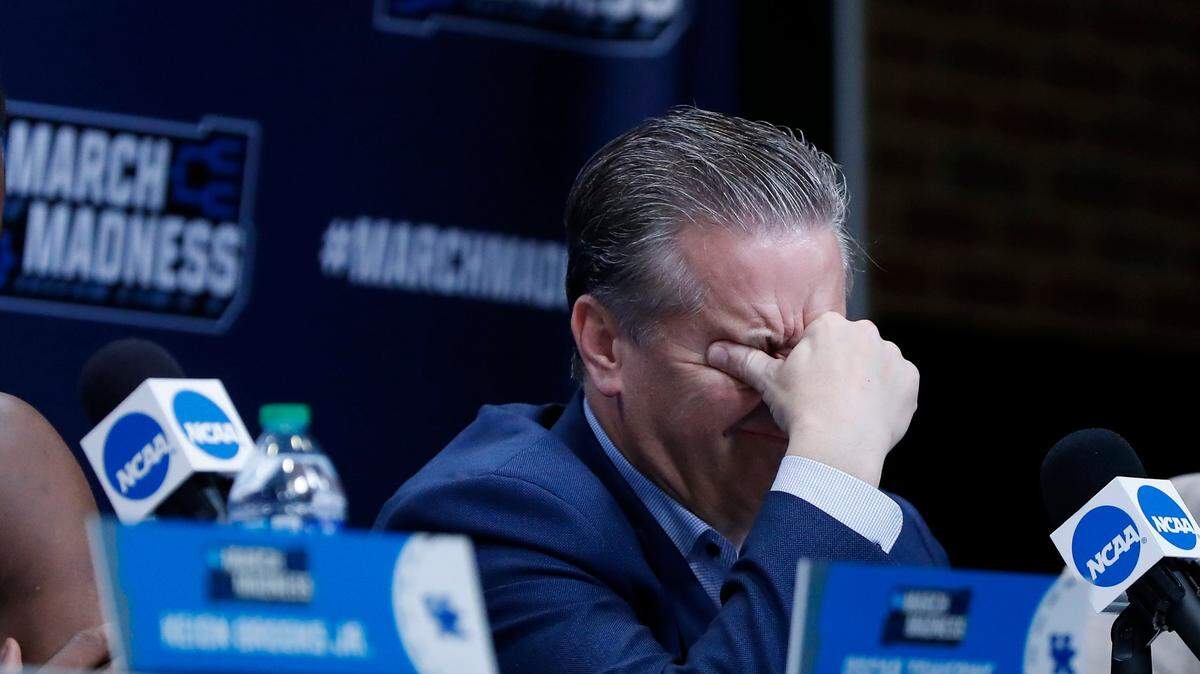 Kentucky Wildcats head coach John Calipari rubs his eyes at a press conference after losing to the St. Peter’s Peacocks during NCAA MenÕs Basketball first round game at Gainbridge Fieldhouse in Indianapolis, In., Thursday, March 17, 2021.