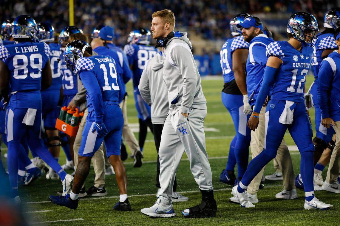 Kentucky quarterback Will Levis (7) walks off the field during a timeout in the game against South Carolina at Kroger Field on Saturday night.