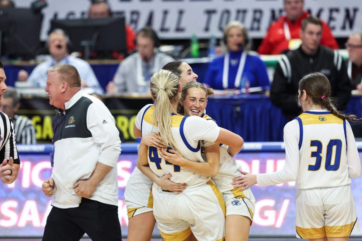 Bethlehem’s Leah Macy (44) celebrates with her teammates after the Banshees advanced to the quarterfinals of the Girls’ Sweet 16 by beating Pikeville in Rupp Arena on Thursday.