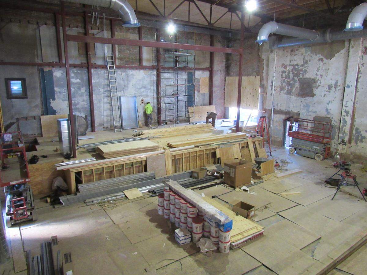 Contractors worked Dec. 9, 2021 rebuilding the interior of the historic Virginia Theater in downtown Somerset. The men were working on what will become the stage.