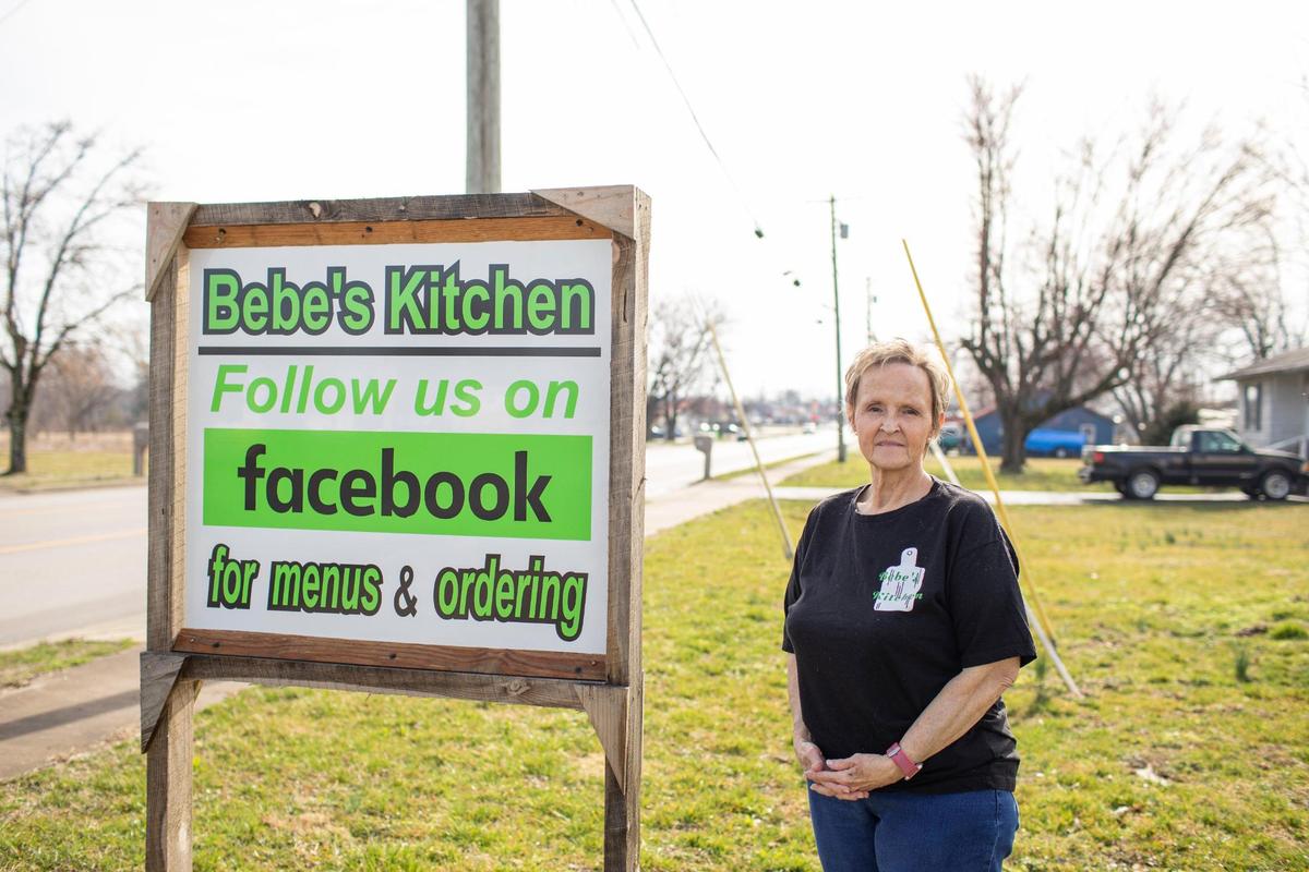 Bonnie Winfrey poses for a portrait at her business, Bebe’s Kitchen in Jeffersonville, Ky., Tuesday, March 16, 2021. Winfrey started cooking out of her home until she was forced to move to a small storefront location. She runs the meals through a private Facebook group and often sells out quickly.