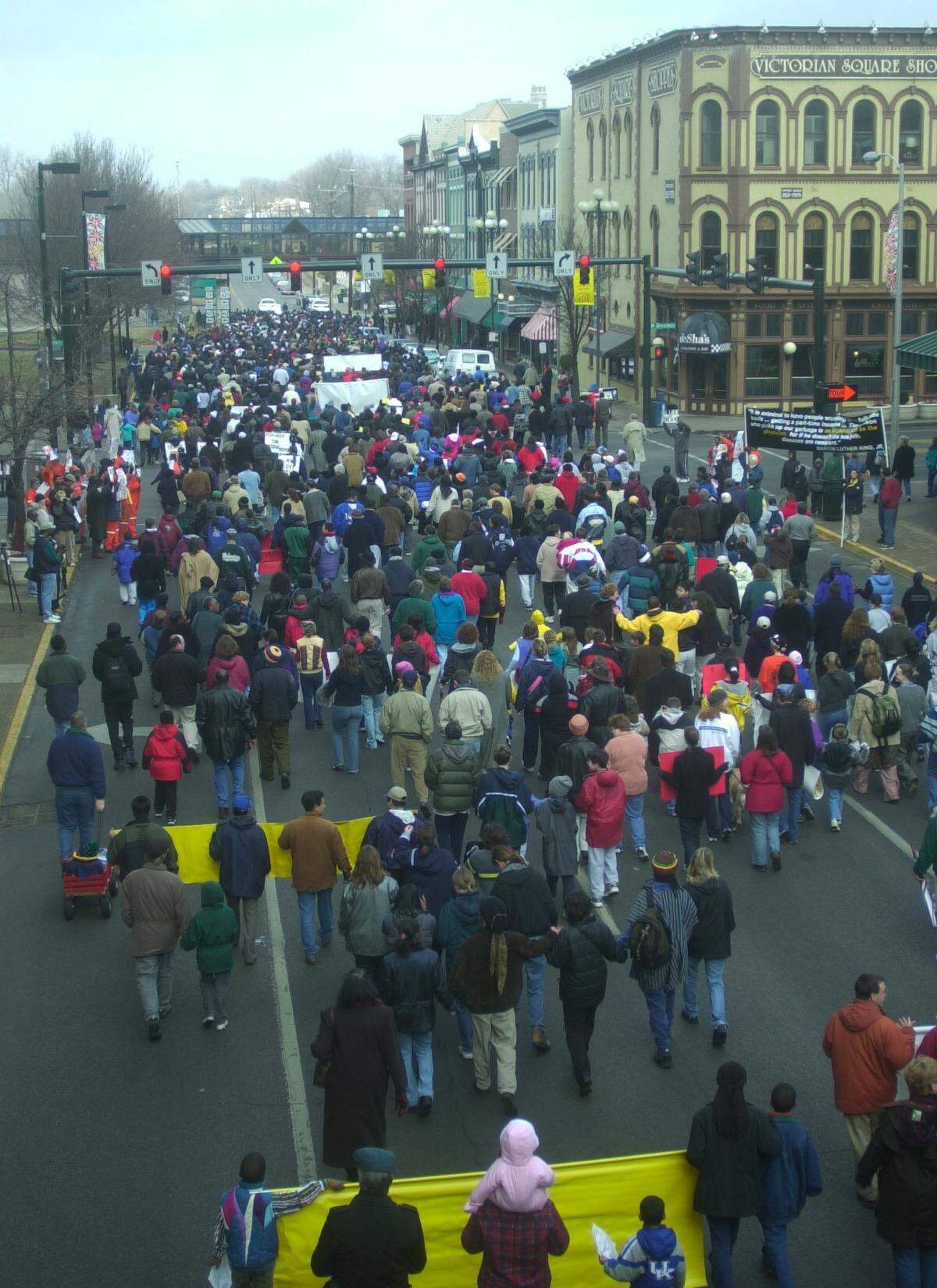 The annual Martin Luther King Jr. march traveled down Vine Street and back by Main Street, here, the last of the crowd approaches Heritage Hall, Lexington, KY, Monday, January 15, 2001.