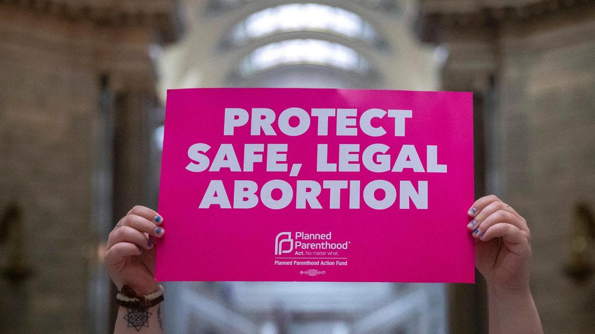 Jace Peters-White of Lexington protests at the Kentucky state Capitol in Frankfort, Ky., on Wednesday, April 13, 2022. Protesters chanted “Bans off our bodies” as they anticipated Kentucky Gov. Andy Beshear’s veto of a sweepingly restrictive abortion bill, HB3, would be overridden.