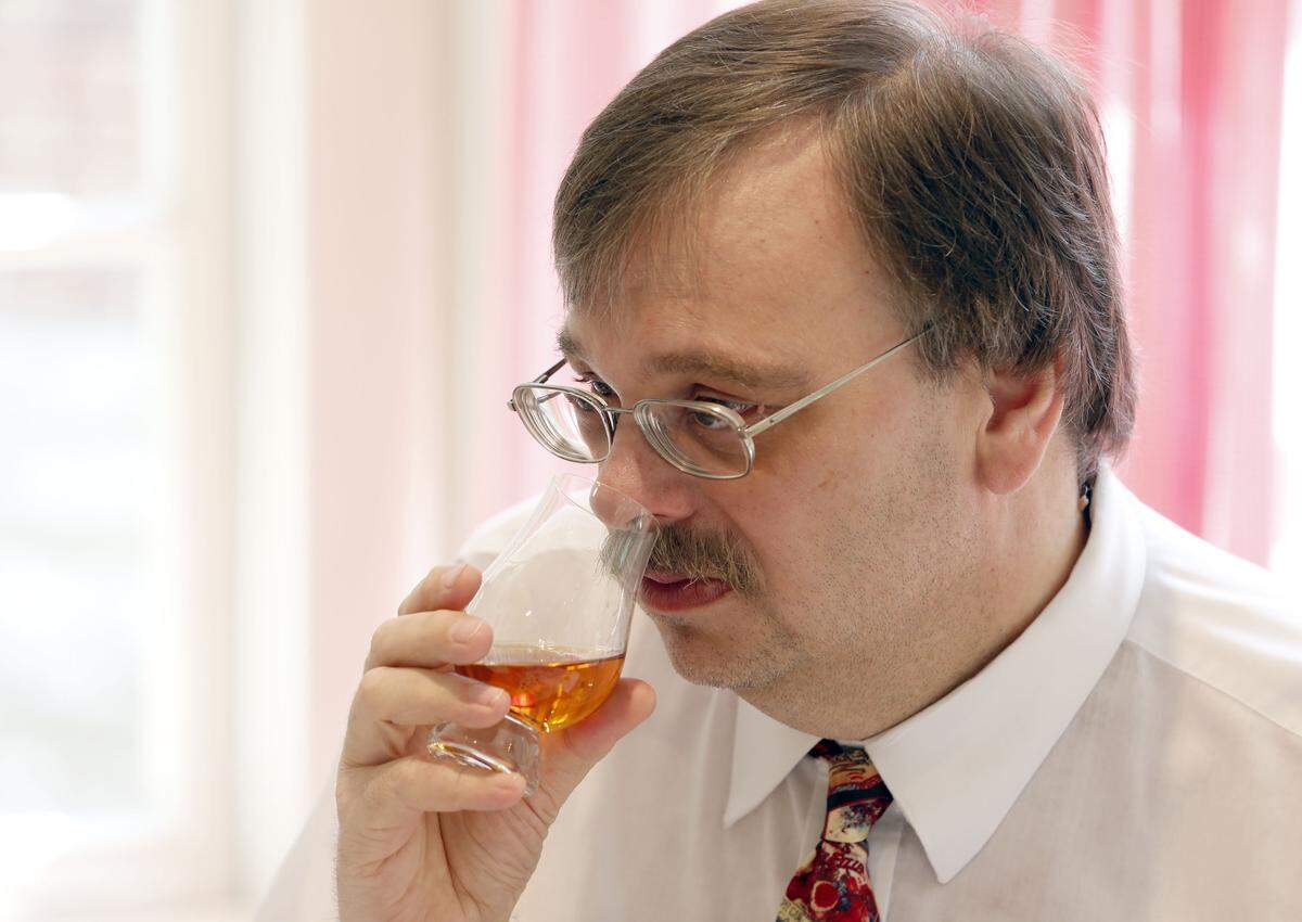 Michael Veach, bourbon historian with the Filson Historical Society in Louisville, nosed a bourbon at a Herald-Leader tasting.