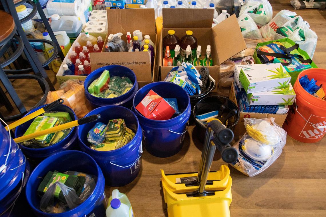 Five-gallon buckets are among the cleaning supplies volunteers have been gathering at Lexington live music club The Burl. They are still accepting donations through Saturday.