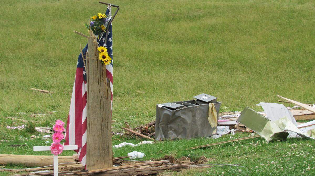 A makeshift memorial marked the spot where firefighters found the body of Melodie Gibson after a tornado demolished the house where she was in Pulaski County, Ky., on May 16, 2025.