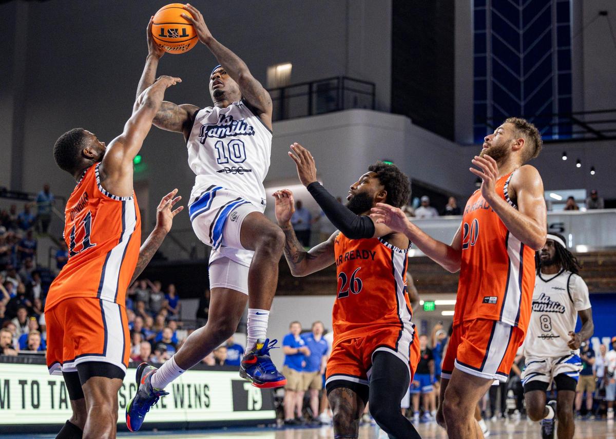 La Familia point guard Archie Goodwin jumps to score a basket during Sunday’s TBT game againt War Ready at Memorial Coliseum.