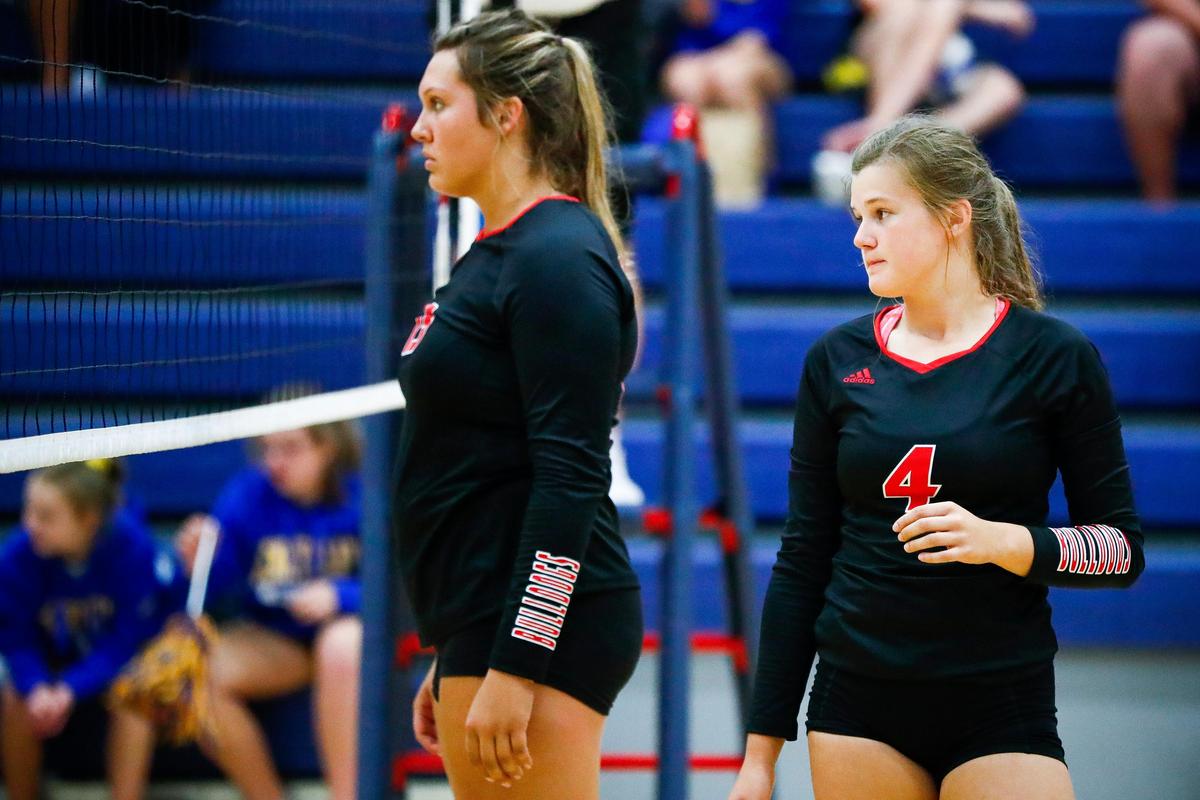 Paul Laurence Dunbar’s Peyton Gash (13), a senior, and Campbell Gash (4), a sophomore, prepared for the next serve during their match against Henry Clay on Tuesday night. The Gashes other sister, Delany, is also on varsity as an eighth-grader.