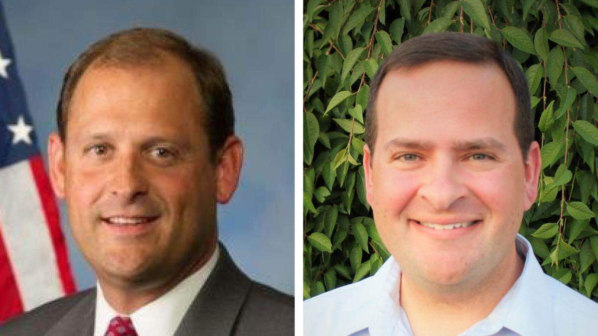 Andy Barr, left, Randy Cravens, right