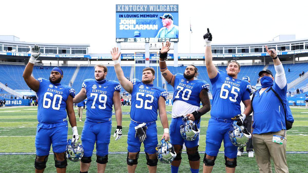 ‘We know he was … coaching us from heaven.’ Big Blue Wall steps up for its coach.