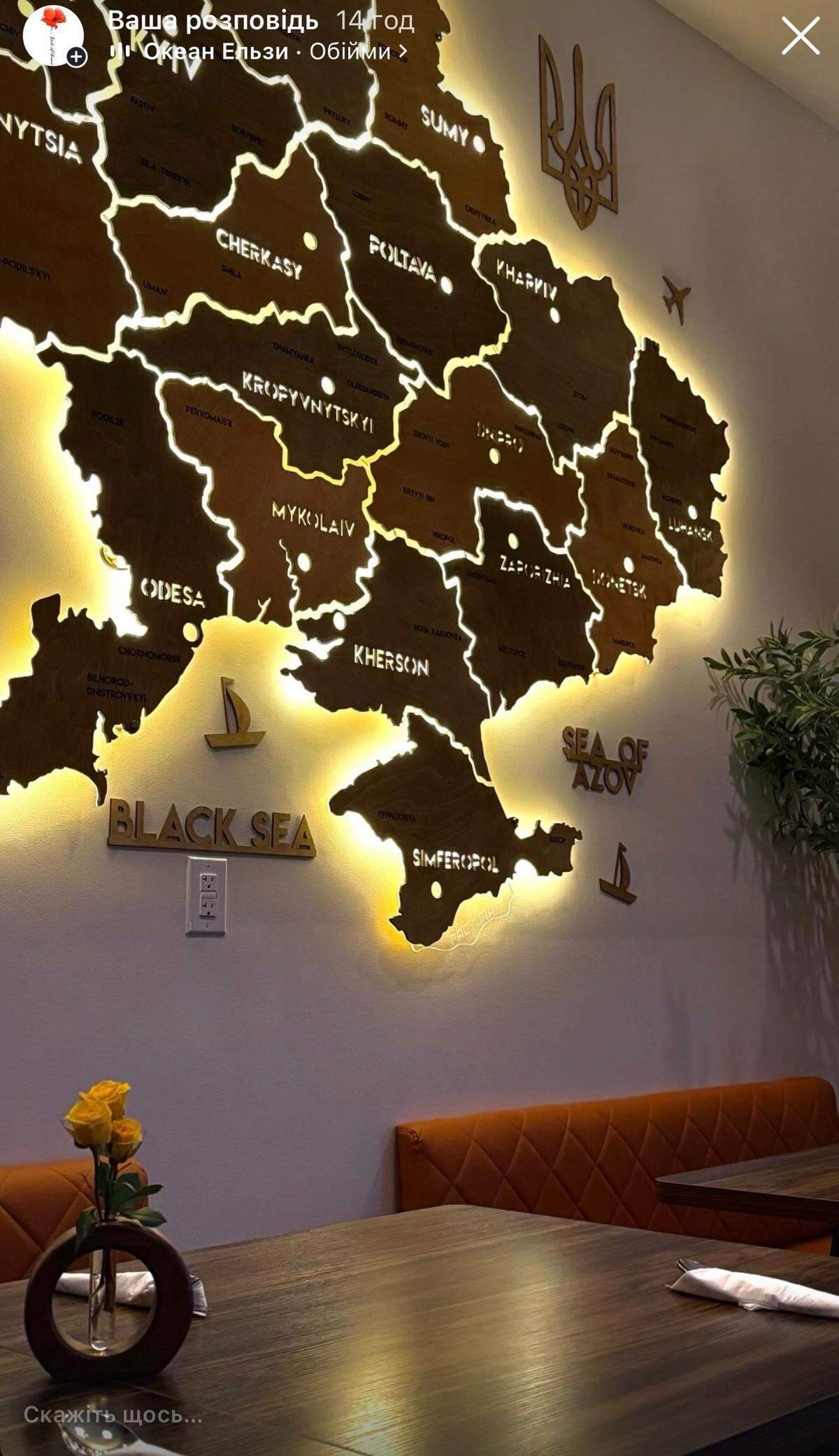 A wall at Taste of Ukraine is decorated with a map highlighting the regions of the Eastern European country. A Ukrainian refugee couple opened the dining spot, which they say is the first authentic Ukrainian restaurant in Kentucky.
