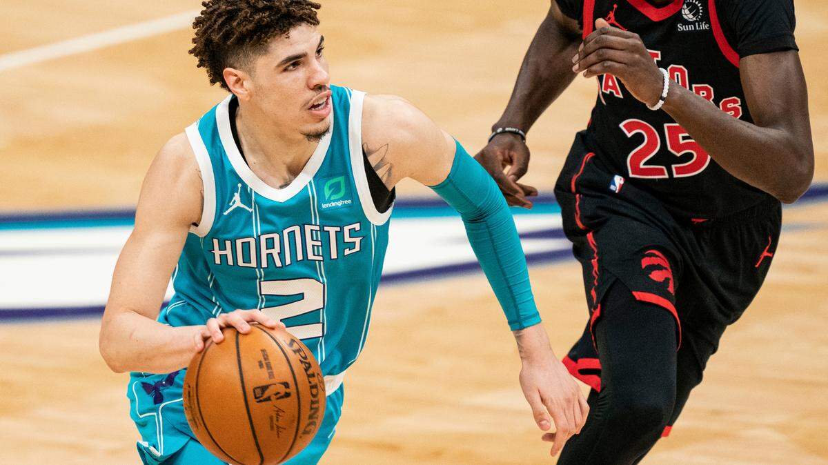 The Charlotte Hornets’ LaMelo Ball, left, played in Lithuania and Australia before becoming the No. 3 pick in the 2020 NBA Draft.