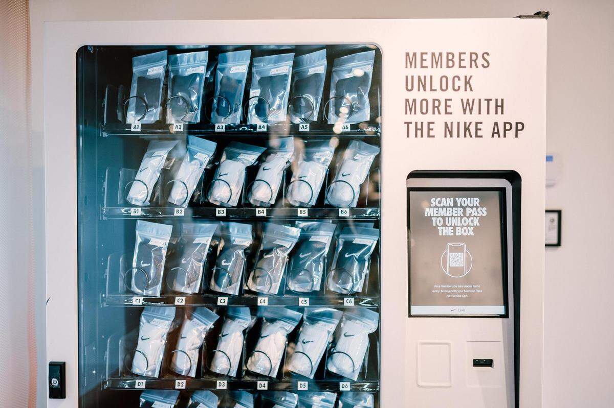 Nike Live stores feature a digital vending machine dubbed the “Unlock Box,” which lets members redeem free products and gifts.