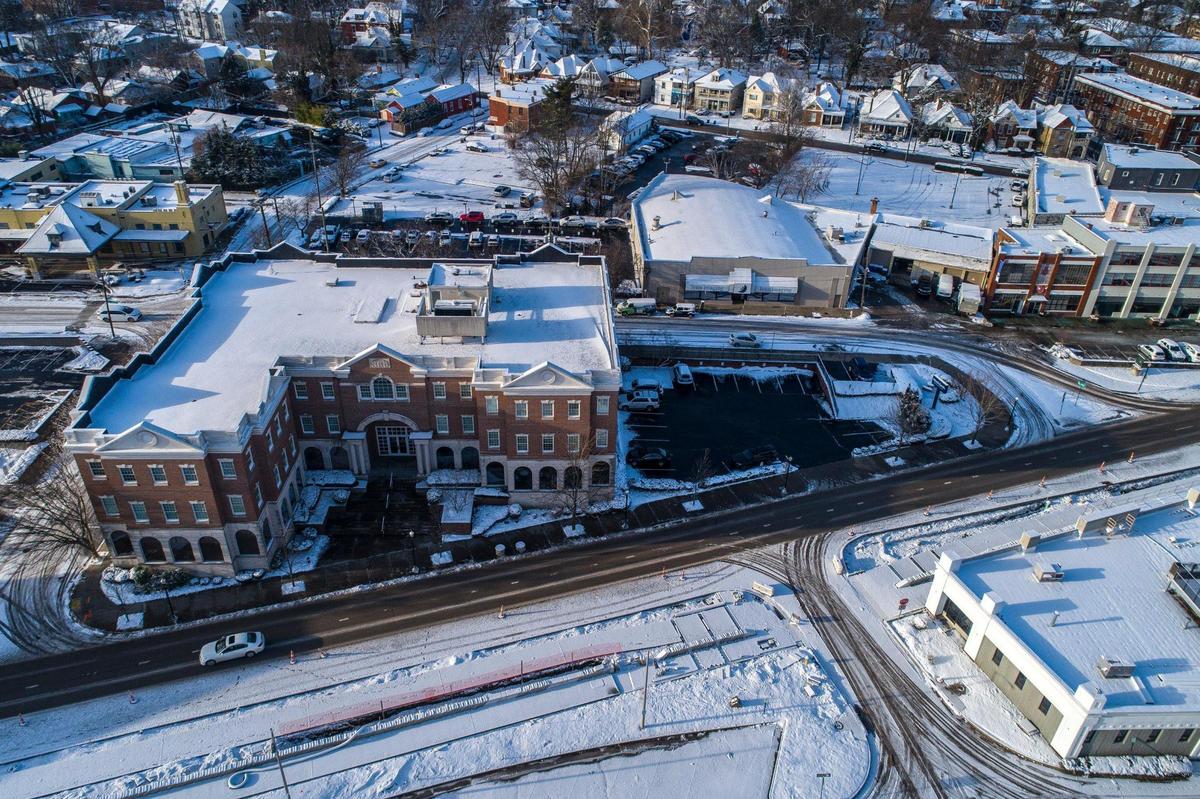 Snow covers building tops and parking lots in downtown Lexington, Ky., on Thursday, Jan. 20, 2022.