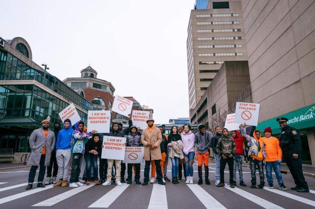 Devine Carama and a group of kids in the It Takes A Village mentoring program participated in the Martin Luther King Jr. March in 2023. The group also enjoyed a breakfast and talked about King Jr.’s legacy.