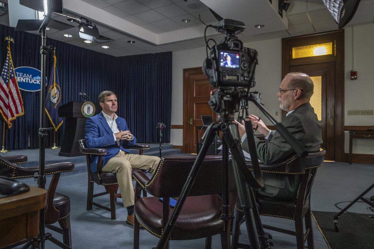 Lexington Herald-Leader reporter Bill Estep interviews Kentucky Gov. Andy Beshear on Wednesday, Dec. 7, 2022.